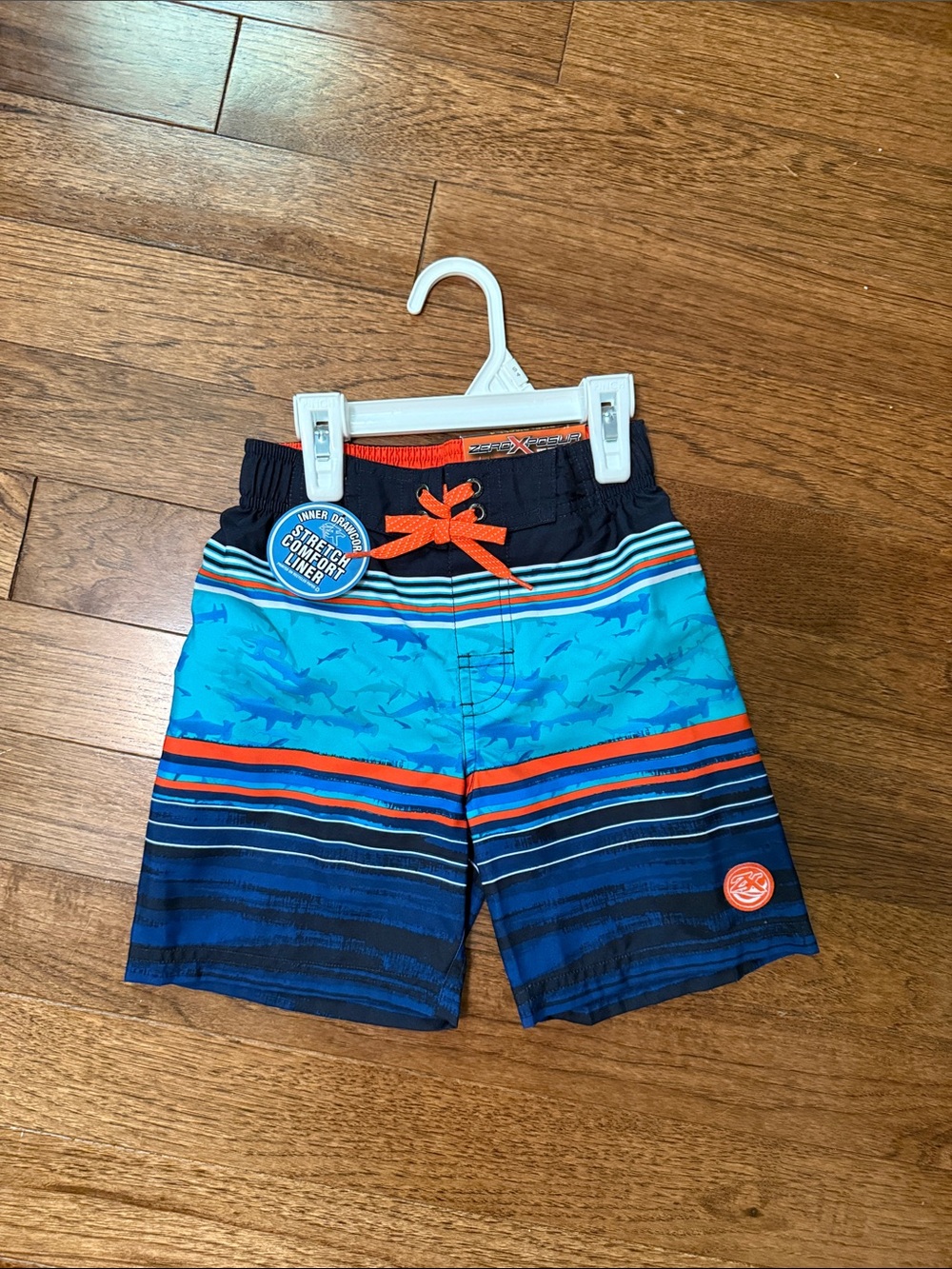 ZeroXposur Blue Shark Stripe Swim Shorts with Orange Drawstring